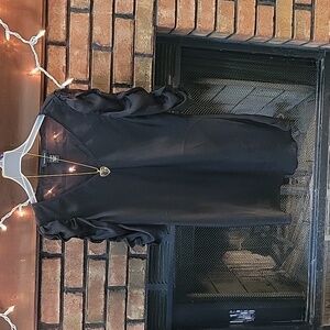 Women's black light weight silky shirt size large.